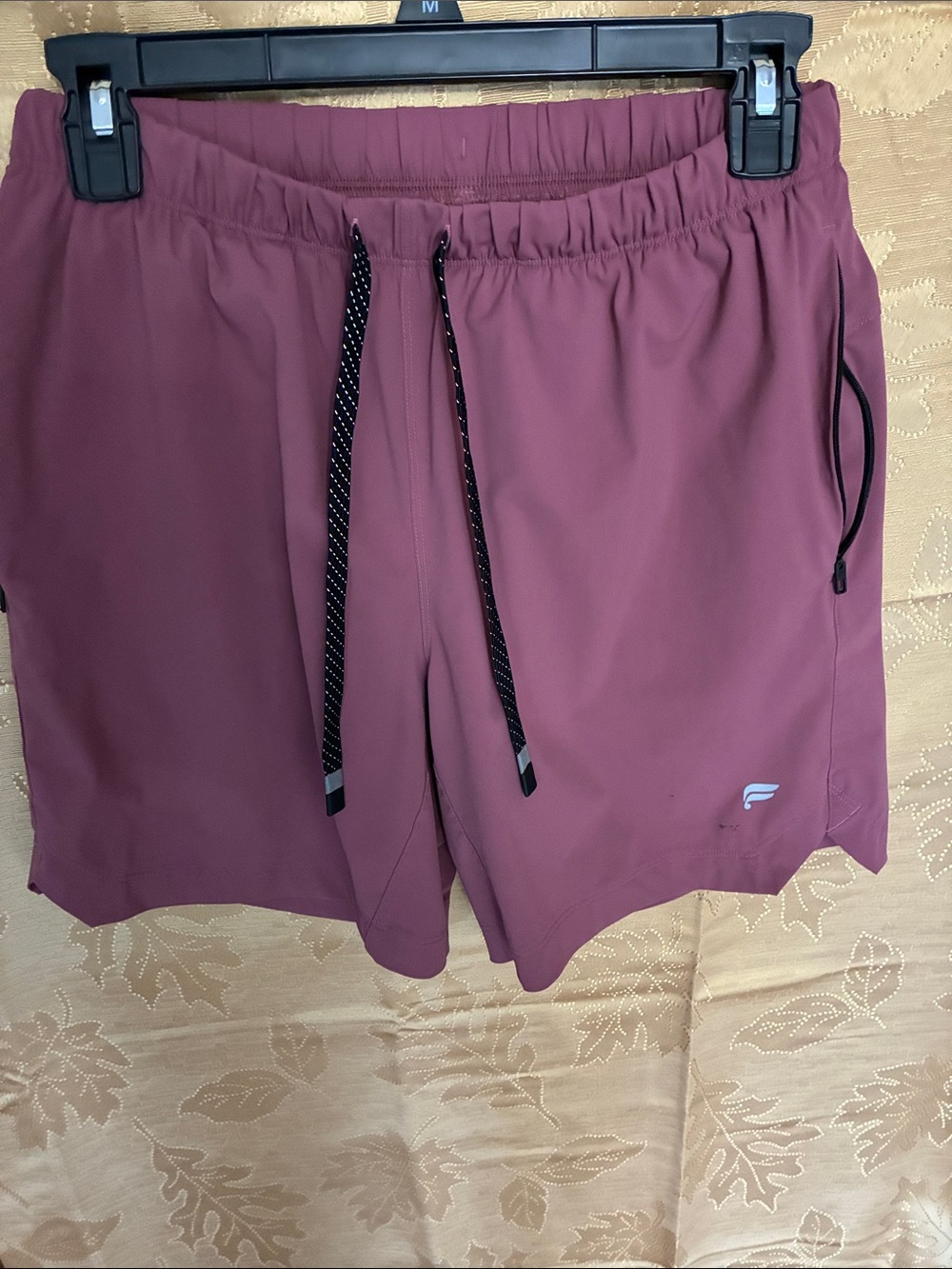 Fabletics Men's Mauve Athletic Drawstring Shorts stain on front left leg see pho